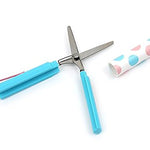 Compact pen-style scissors for various uses.
