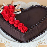 Non-stick steel baking tray for heart-shaped cakes.