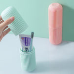 Capsule-shaped organizer for portable storage, available in multiple colors.