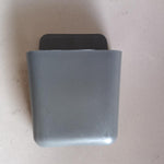 Multicolour remote storage organizer, wall mounted.