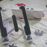 Adjustable stand for tablets with foldable legs