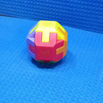 Activity cube with vibrant colors for children.