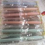 Round brush for hair with blow drying capability