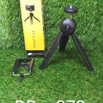 Mini tripod in use with camera